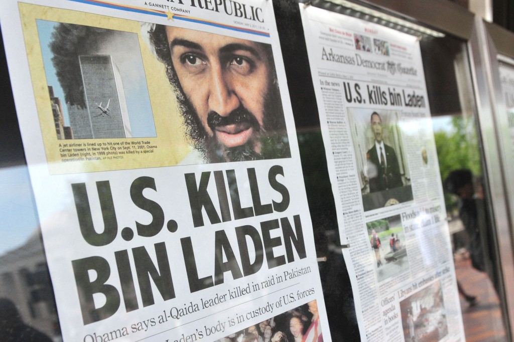 Front pages headlines from around the country that announce the death of Al-Qaida terror leader Osama bin Laden are seen in front of the Newseum in Washington on May 2, 2011.   UPI/Kevin Dietsch