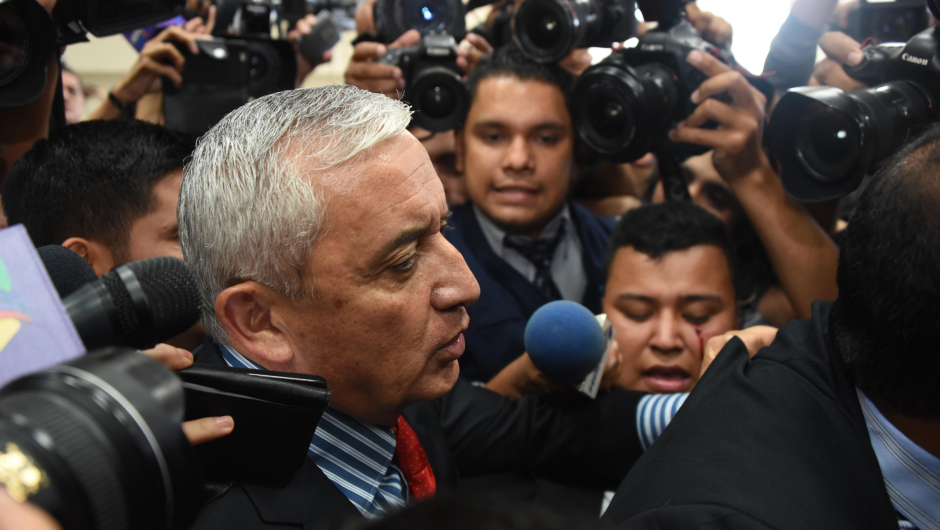 Guatemalan former President Otto Perez arrives at the Tribunal of Justice in Guatemala city on September 3, 2015. Embattled Guatemalan President Otto Perez resigned Thursday after a judge issued a warrant for his arrest to face corruption charges, upending the political landscape three days ahead of general elections.   AFP PHOTO / Johan ORDONEZ        (Photo credit should read JOHAN ORDONEZ/AFP/Getty Images)