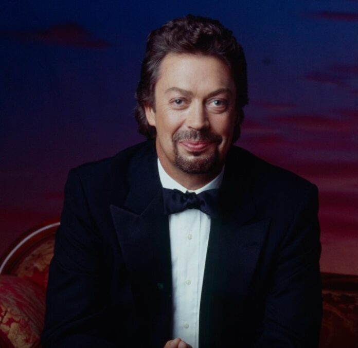 TIM CURRY